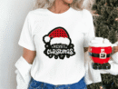 Classic Merry Christmas T-Shirt – Festive Cheer Printed in Sparkhill, Birmingham Get the whole family into the ultimate holiday spirit with matching unisex tees, lovingly crafted right here in the vibrant B11 area. Kicking Off the Festive Cheer Right, it’s that time of year again! The dark nights have drawn in, the decorations are finally coming down from the loft, and the festive buzz is officially taking over. If you’re looking to get the whole family matching for the local winter market over in Springfield, or you just want a cracking top for lounging on the sofa while watching classic holiday films, we’ve got you sorted. Our Merry Christmas T-Shirt is available in a brilliant unisex fit for both kids and adults, making it the perfect staple for your winter wardrobe. Imagine strolling down the Stratford Road shopping district looking properly coordinated with the little ones—it’s what making holiday memories is all about! Here at Funky Arts Ltd, we absolutely refuse to flog cheap, scratchy seasonal wear that ends up in the bin by New Year. We are all about proper local craftsmanship. Every single premium textile print is set up, meticulously pressed, and rigorously checked by our own team right here in our bustling workshop. Nipping into our unit at the Souk Shopping Centre is a right treat this time of year; you can literally smell the hot ink curing and feel the crackling, festive energy of the Birmingham creative arts scene in full swing. We put real Brummie graft into creating a stunning bespoke design that you’ll want to pull out of the wardrobe year after year. We also know the holidays are delightfully chaotic. That’s exactly why we print exclusively on high-quality, sustainable apparel that easily survives spilled gravy, sticky mince pie fingers, and endless running around. Plus, because our whole operation is firmly rooted right here in the West Midlands, our famously quick Birmingham delivery means you won't be anxiously waiting on the postie on Christmas Eve. Sorted. The "Souk Quality" Promise Like a Gentle Hug: Crafted from incredibly soft, breathable ringspun cotton-rich blends that keep you perfectly comfortable even when the grandparents have the central heating absolutely blasting. The 'Brummie Wash-Test' Guarantee: Spilled a cheeky bit of cranberry sauce or dropped a chocolate coin down your front? Not to worry. We lock our inks deep into the textile fibres, meaning your festive greeting won't crack, peel, or fade in the washing machine. Rooted in the Midlands: Proudly pressed, packed, and rigorously quality-checked by our own dedicated team at Unit 8, Souk Shopping Centre, Birmingham. Kind to the Planet: We champion 100% vegan, water-based inks and ethically sourced UK blanks, keeping our eco-footprint perfectly small for future Christmases. Find Us Locally Want to see where the festive magic happens before you buy your matching sets? Pop down to our creative hub! You can find Funky Arts Ltd at Unit 8, Souk Shopping Centre, Stratford Road, Sparkhill, Birmingham (B11 4BS). Whether you’re a local wanting to sort out tops for the whole family in person, or you prefer to get your Christmas shopping done whilst having a mince pie on the sofa, you can easily place your order online at https://www.google.com/search?q=printifythread.com. Support independent Birmingham businesses this Christmas!